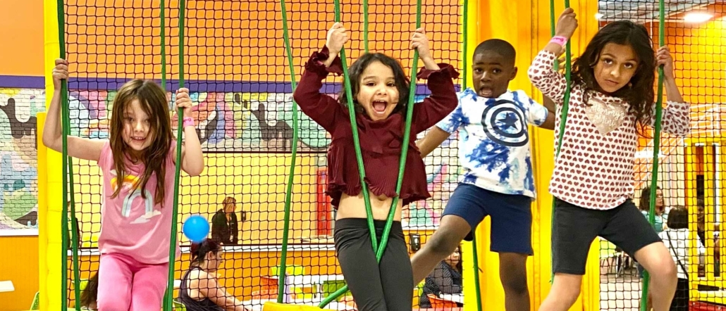 kids playing in ball pit